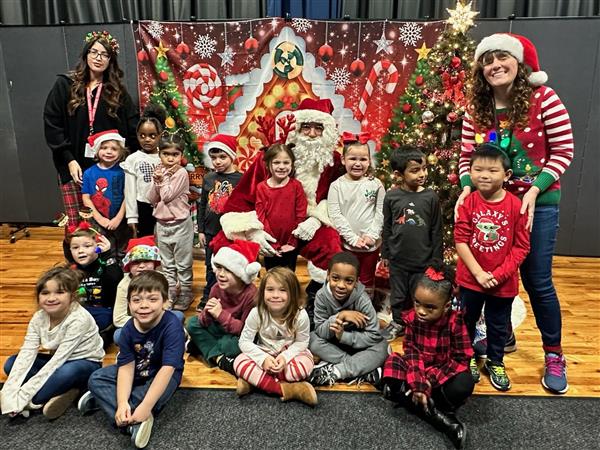 Mrs. Clancy-Nill's class visits with Santa